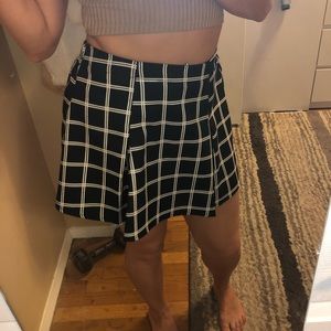 Pleated black and white checkered skirt